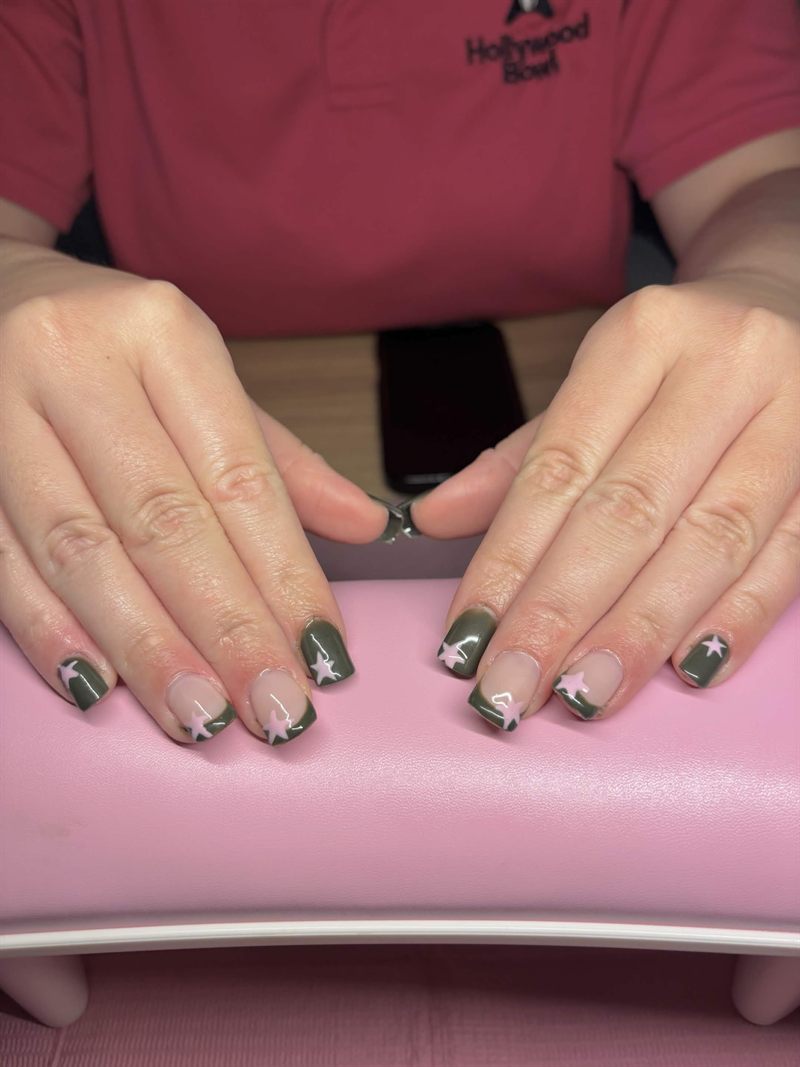Short khaki green French nails with pink stars