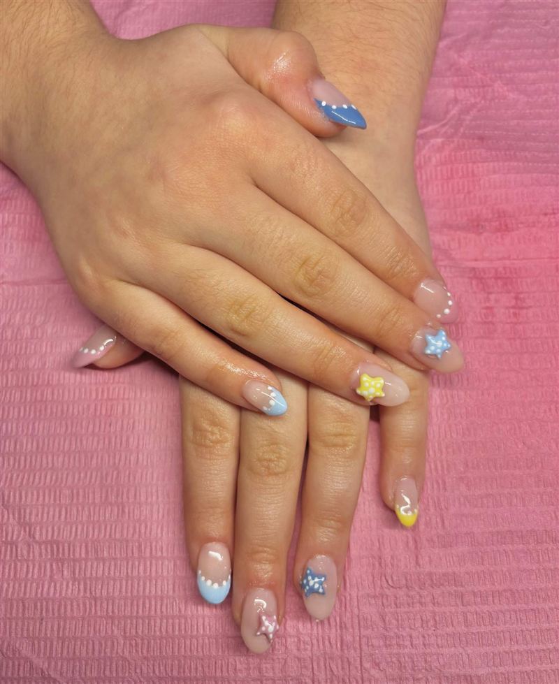 Pastel French tips with 3D sculpted gel starfish